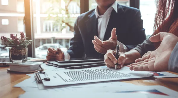 insurance consultants taking notes