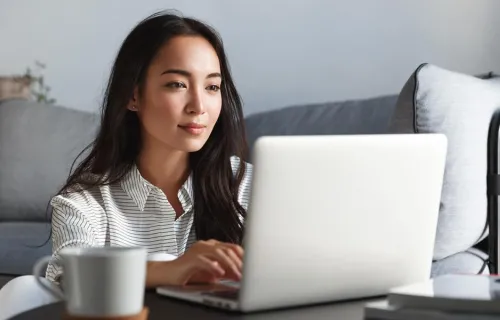 Consultant uses laptop to access cyber training from home
