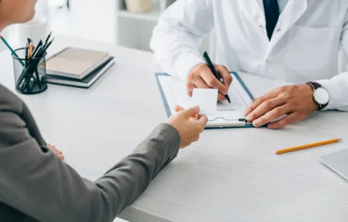 patient meeting with medical practicioner