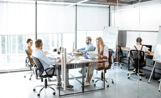 group of developers working at a table